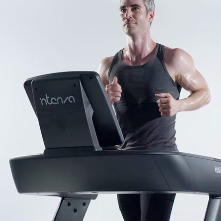 man running on treadmill